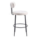 Bar stool with white cushioned seat and backrest on a white background