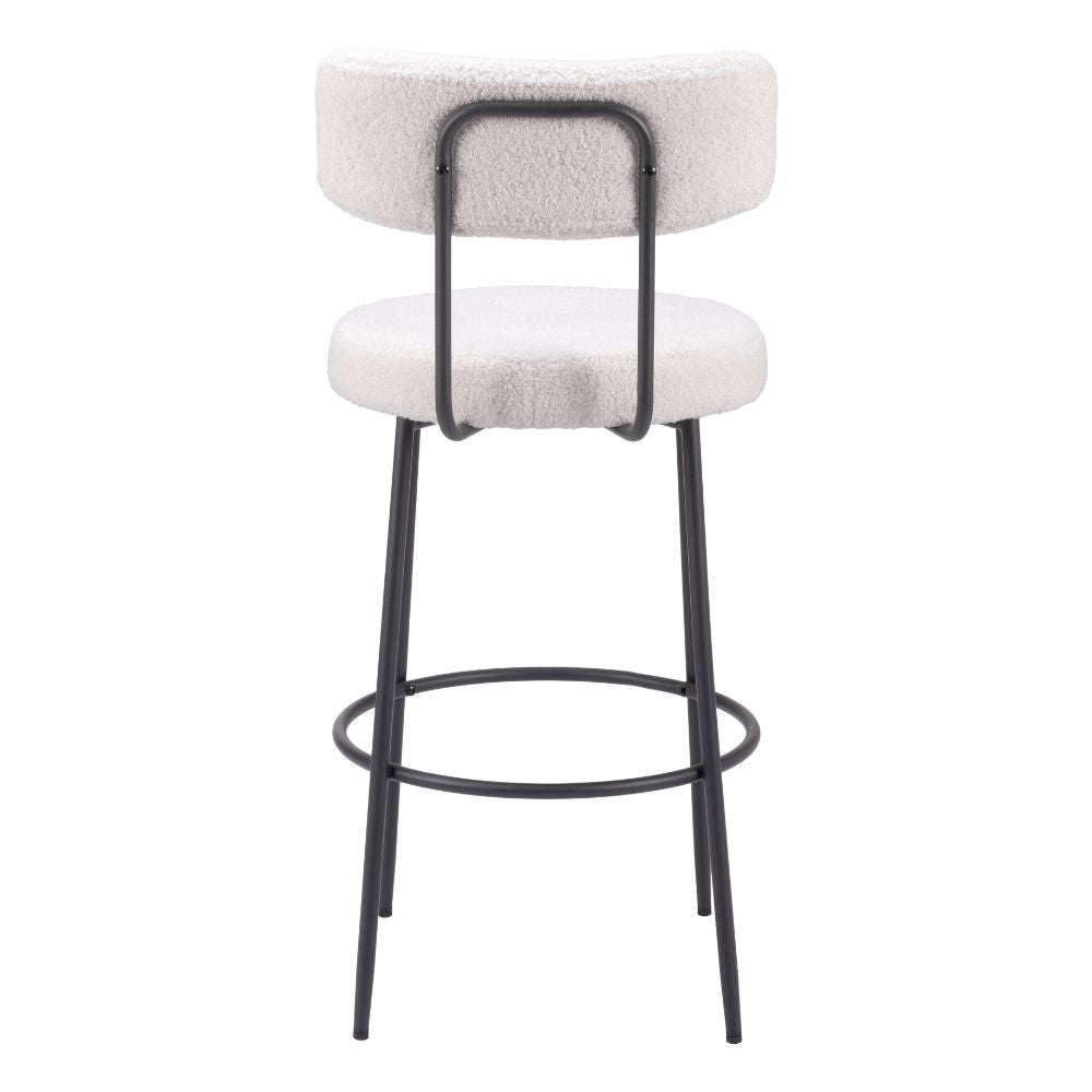 Bar stool with white cushioned seat and backrest, black metal frame on a white background