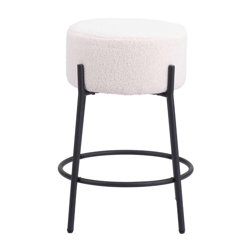 Bar stool with white cushioned seat and black metal legs on a white background