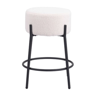 Bar stool with white cushioned seat and black metal legs on a white background