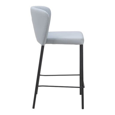 White bar stool with black metal legs on a white background