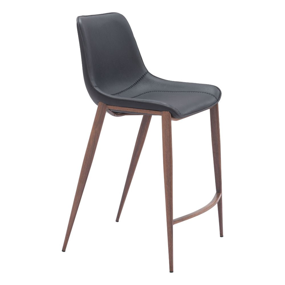 Bar stool with dark gray seat and wooden legs on a white background