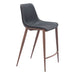 Bar stool with dark gray seat and wooden legs on a white background