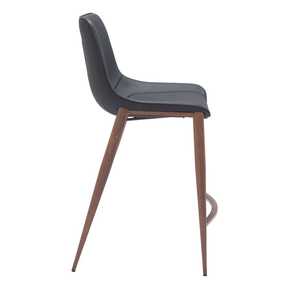 Bar stool with gray cushioned seat and wooden legs on a white background