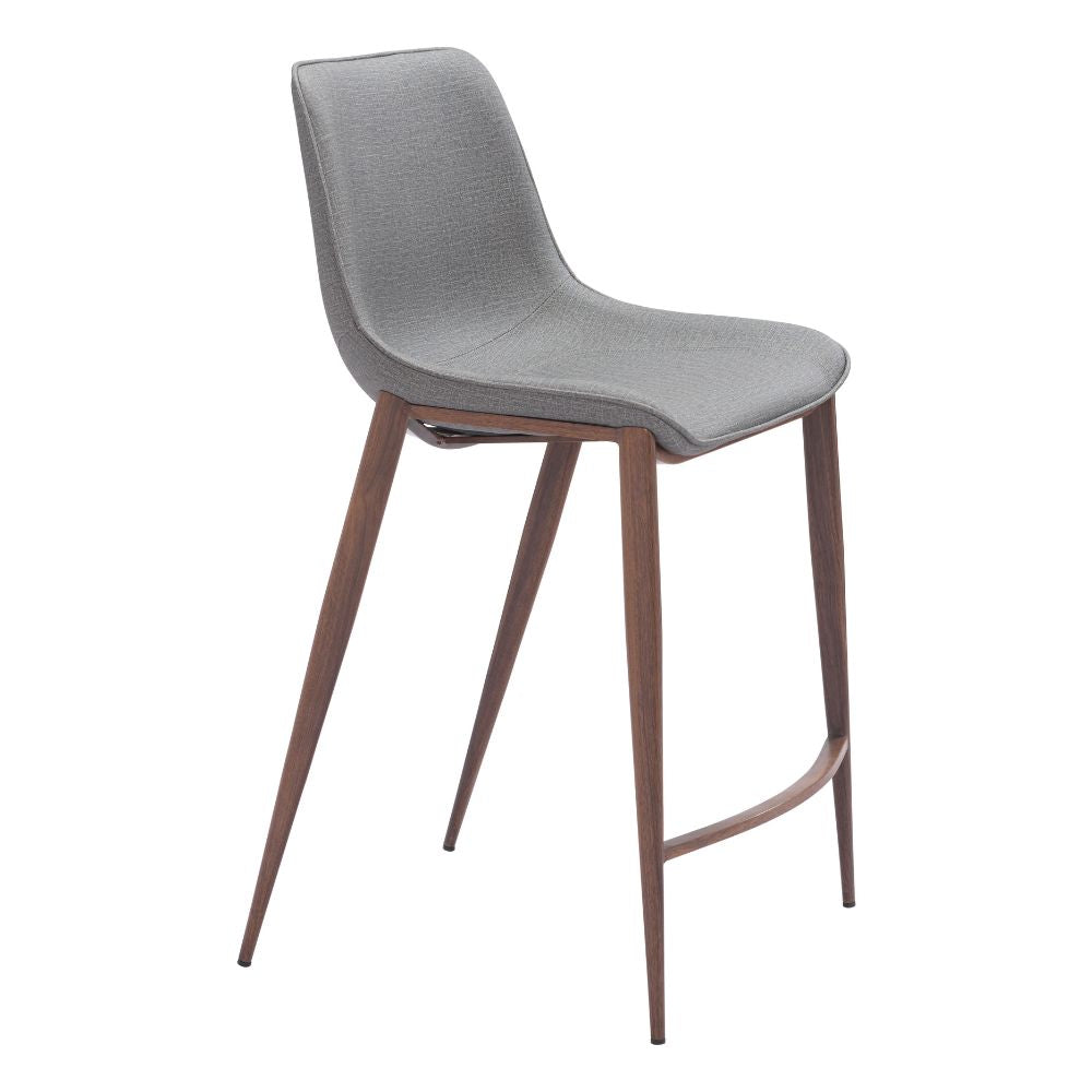 Gray cushioned bar stool with wooden legs on a white background