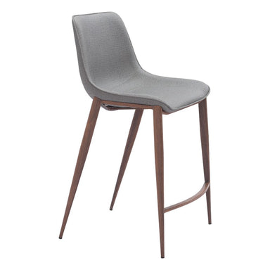 Gray cushioned bar stool with wooden legs on a white background