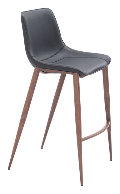Bar stool with gray cushioned seat and wooden legs on a white background