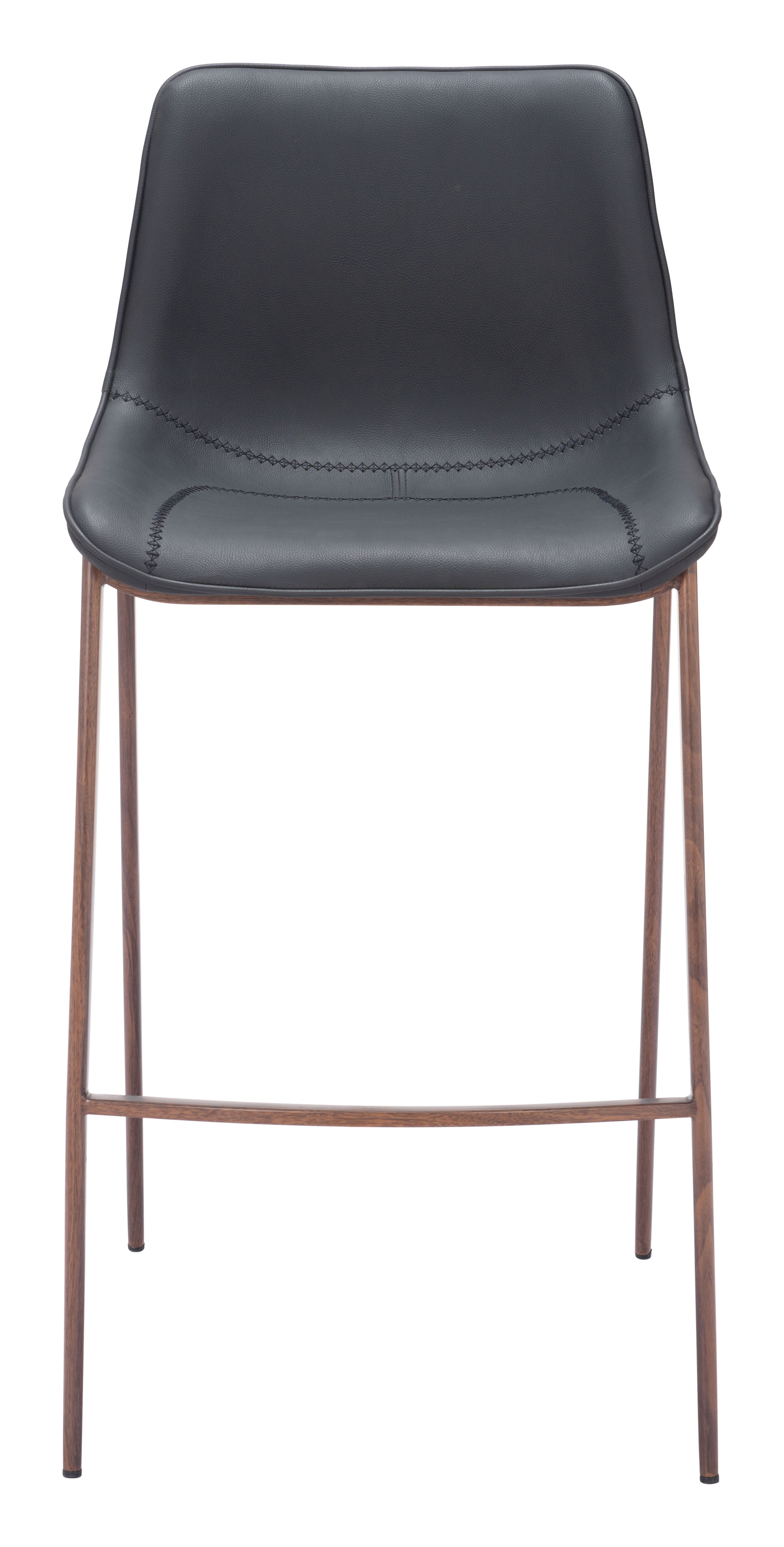 Black bar stool with bronze legs on a white background