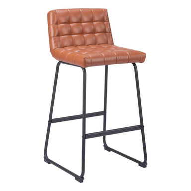 Brown bar stool with quilted seat on a white background