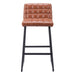 Brown bar stool with black metal legs on a white background