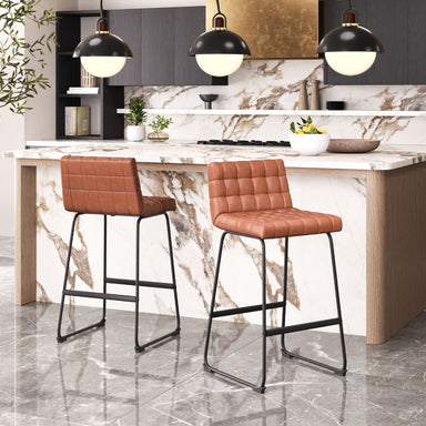 Two brown bar stools in a modern kitchen with marble countertops and pendant lights.