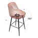 Bar stool with a pink seat and black metal legs on a white background
