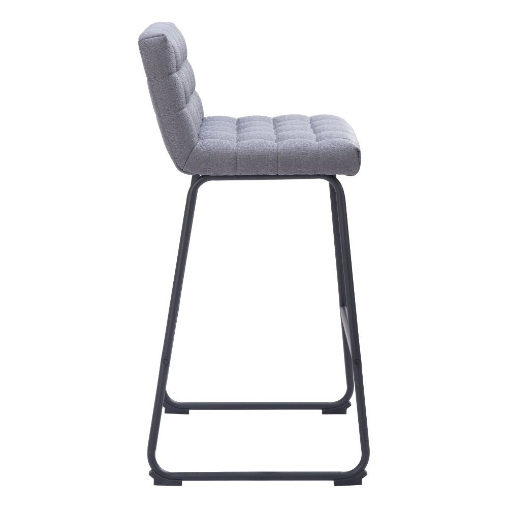 Gray bar stool with quilted seat on a white background