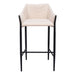 Beige bar stool with black metal frame on a white background