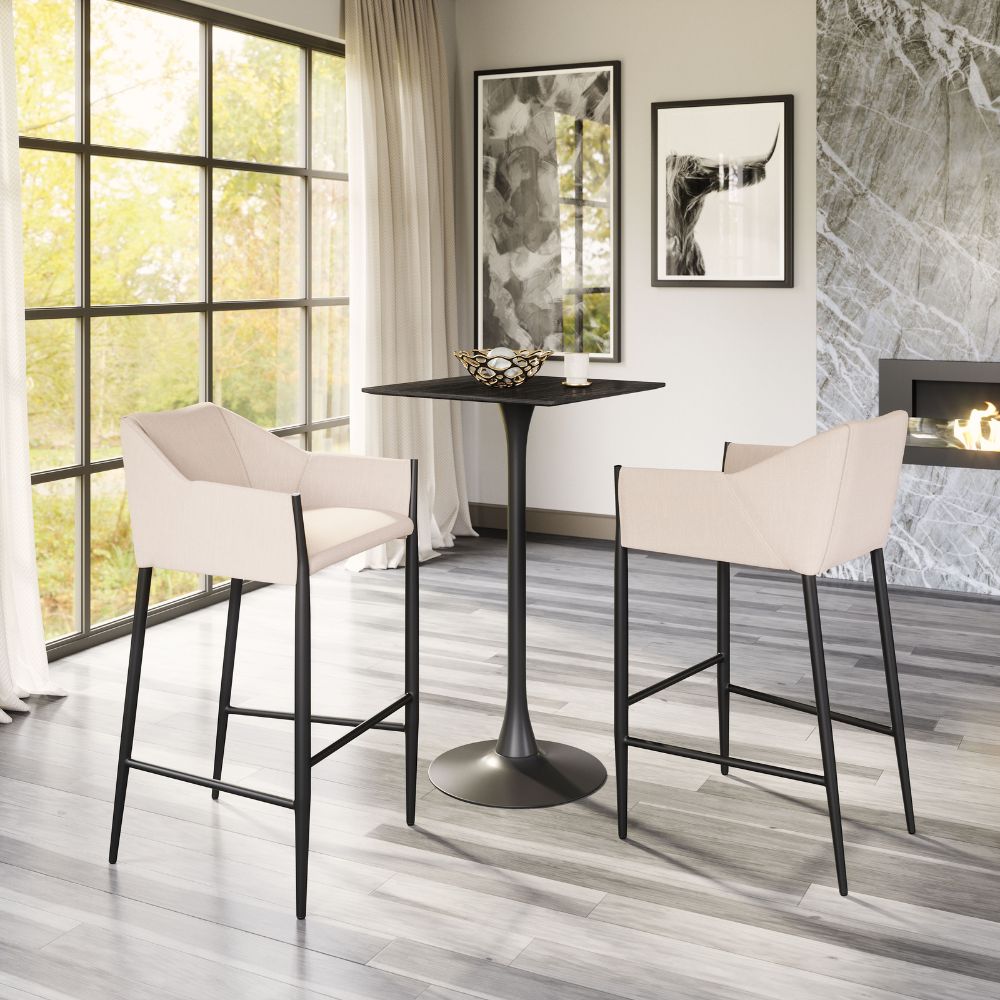 Modern bar height table with two stools in a stylish room with large windows and decorative wall art.