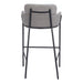 Gray bar stool with black metal legs on a white background