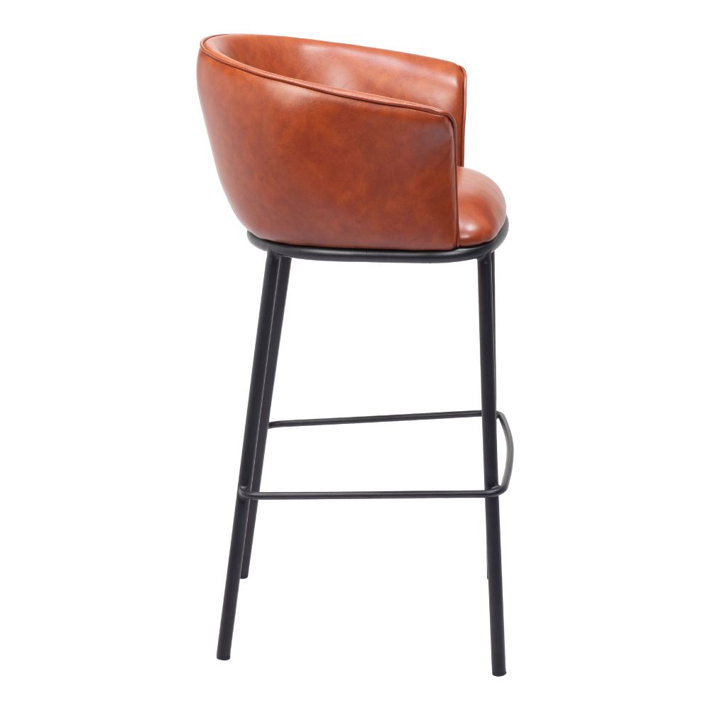 Brown leather bar stool with black metal legs on a white background