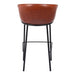 Brown leather bar stool with black metal legs on a white background