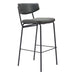 Bar stool with black metal frame and gray cushioned seat on a white background