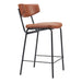 Bar stool with brown leather seat and backrest on a white background