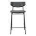 Bar stool with black leather seat and metal frame on a white background