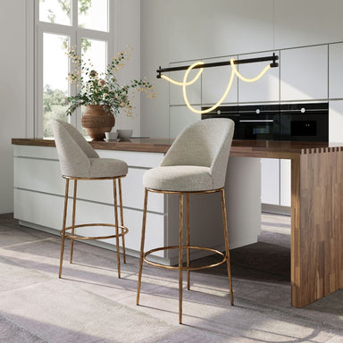 Modern kitchen with bar stools and a wooden countertop