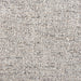 Close-up of a textured beige and black fabric pattern