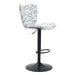 Bar stool with white seat featuring black abstract patterns on a white background