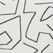 Close-up of a geometric pattern with black lines on a gray background
