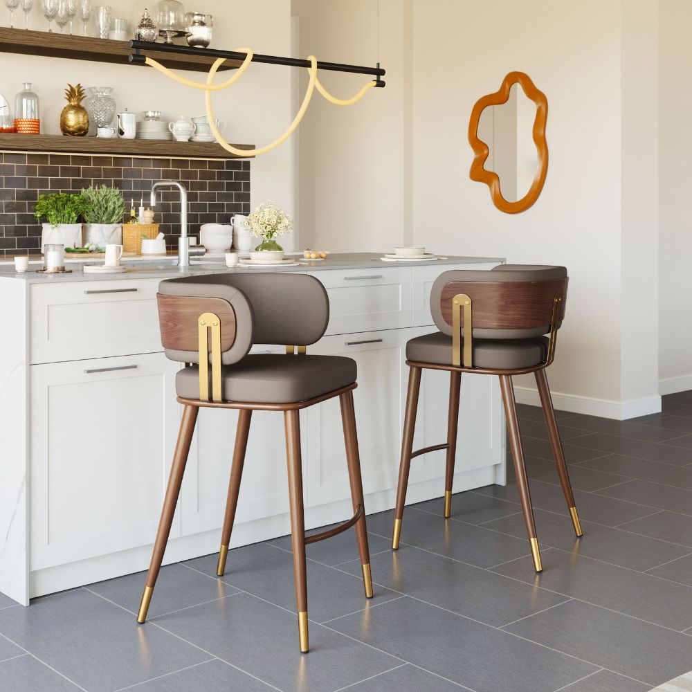 Modern kitchen with two bar stools featuring wooden frames and brown seats.