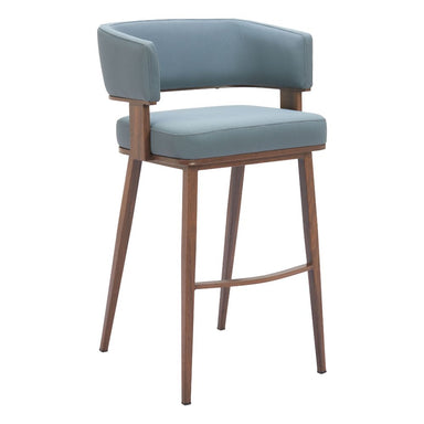 Blue cushioned bar stool with wooden legs on a white background