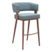 Blue cushioned bar stool with wooden legs on a white background