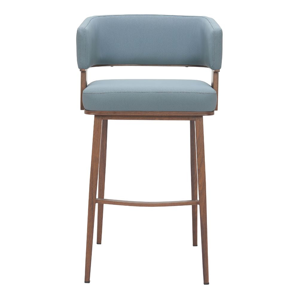 Blue cushioned bar stool with wooden legs on a white background