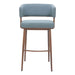 Blue cushioned bar stool with wooden legs on a white background