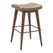 Bar stool with brown cushioned seat and wooden legs on a white background