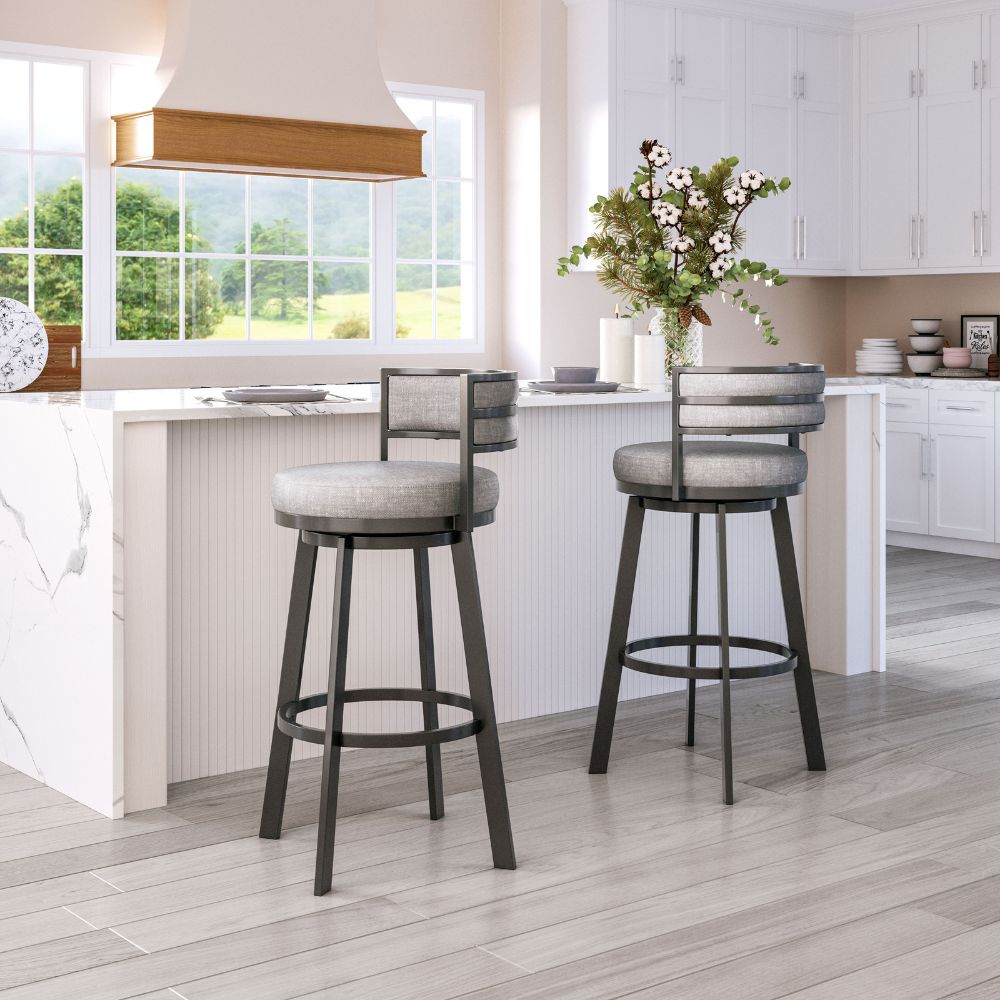 Two gray bar stools with black metal legs in a kitchen setting.
