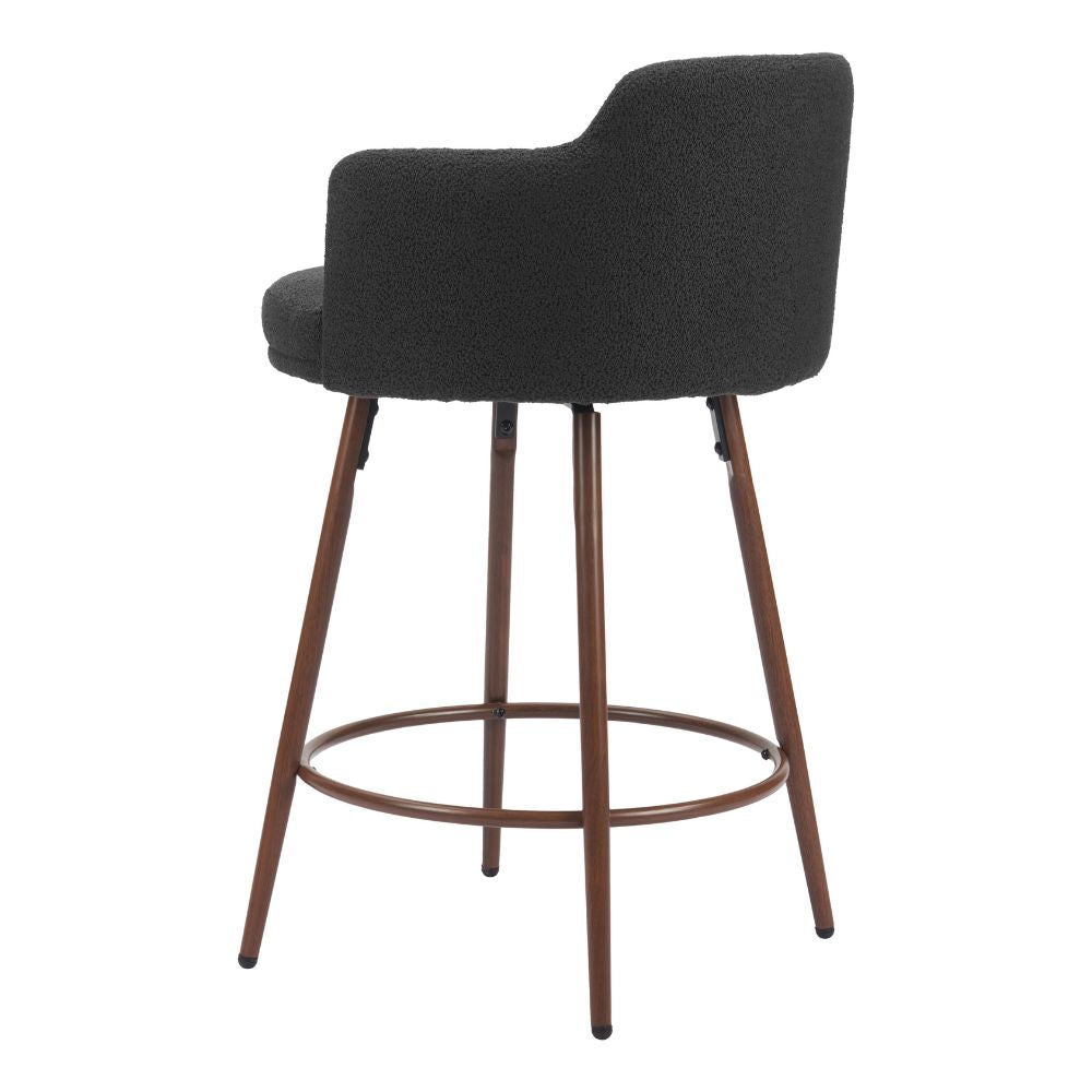 Bar stool with black upholstered seat and bronze metal legs on a white background