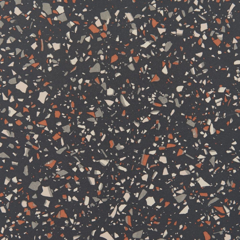 Patterned surface with multicolored chips on a dark background