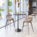 Modern bar stools with metal wire backrests and beige cushioned seats around a black table in a stylish interior setting.