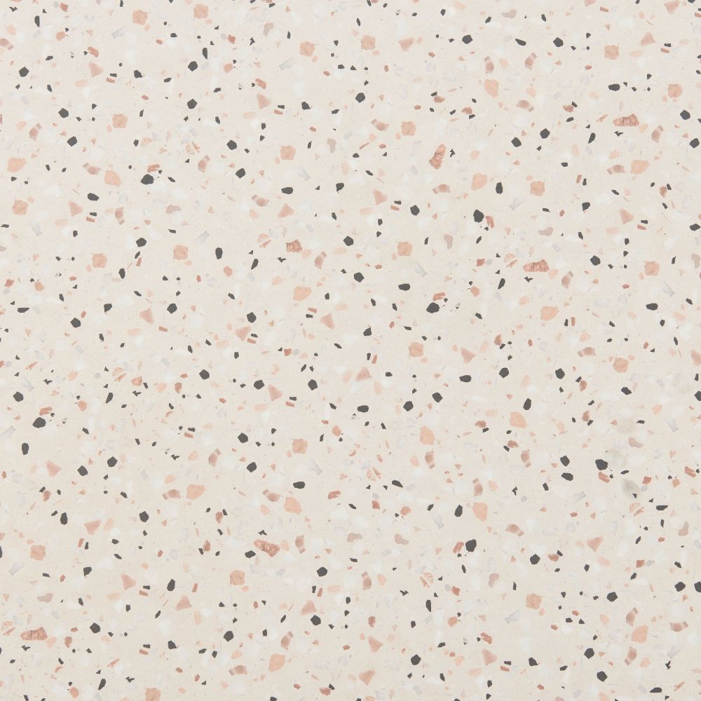 Terrazzo pattern with small specks of pink, black, and gray on a light beige background