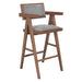 Wooden bar stool with gray cushioned seat and backrest on a white background