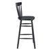 Black wooden bar stool on a white background