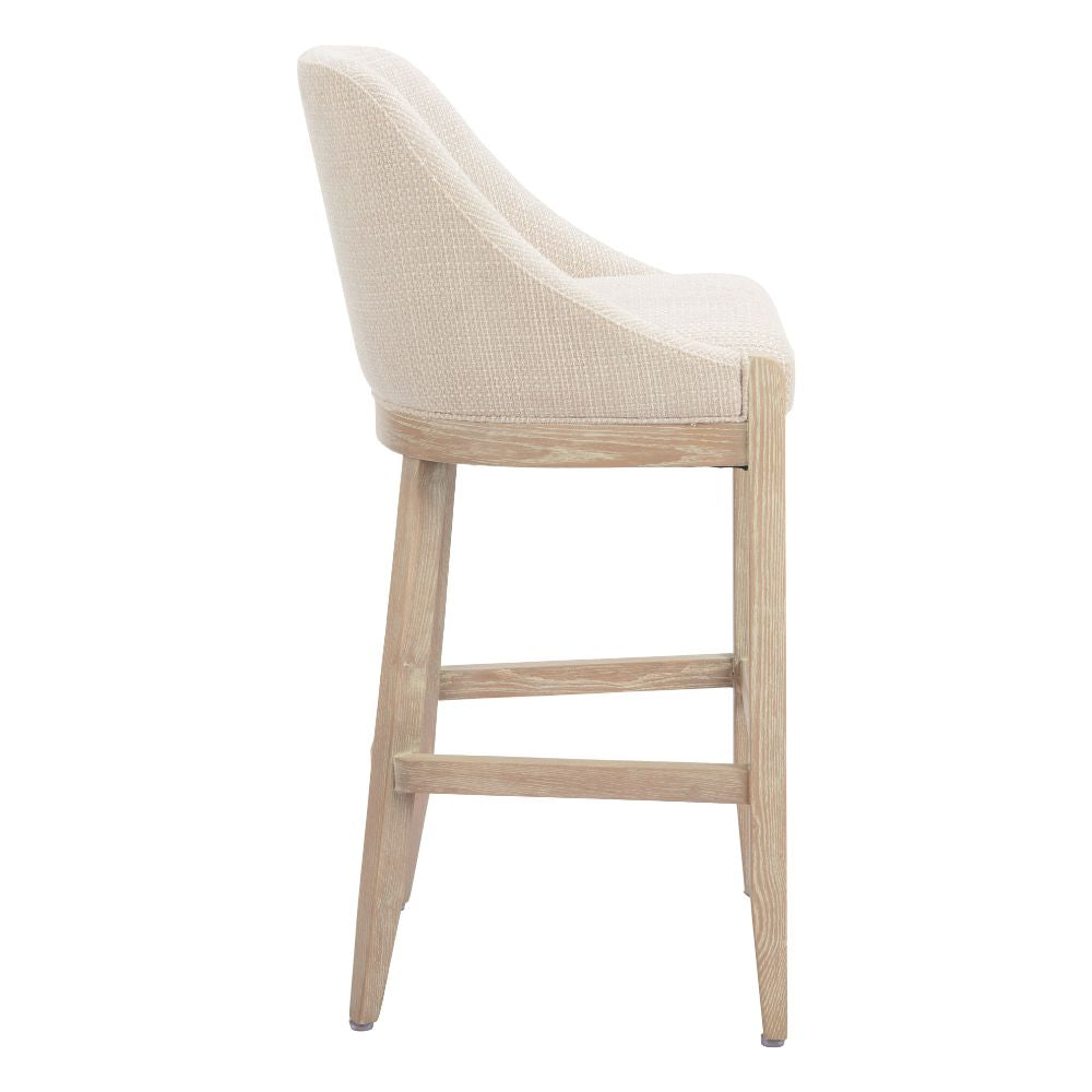 Bar stool with beige cushioned seat and wooden legs on a white background