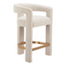 Beige bar stool with gold legs on a white background