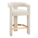 Beige bar stool with gold base on a white background