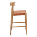 Wooden bar stool with woven seat on a white background