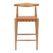 Wooden bar stool with woven seat on a white background
