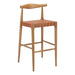 Wooden bar stool with woven seat on a white background