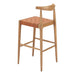 Wooden bar stool with woven seat on a white background