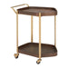 Wooden serving cart with gold accents on a white background